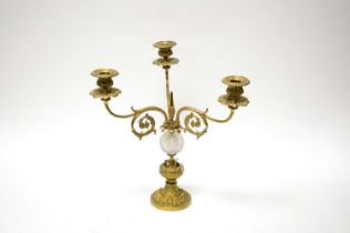 An Art Nouveau style brass candelabra