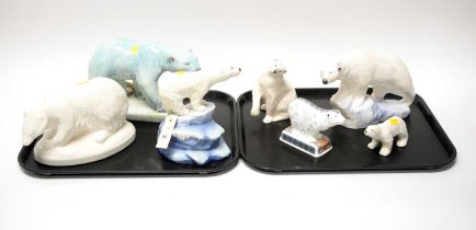 A collection of ceramic polar bear figures