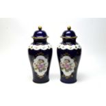 A pair of German Echt Cobalt urn vases with covers