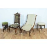 Two Victorian carved nursing chairs and two stools.