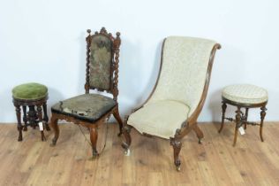 Two Victorian carved nursing chairs and two stools.