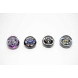 Four limited edition Caithness paperweights