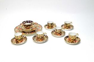 A set of six Royal Crown Derby ‘Imari’ pattern coffee cups and saucers; and others