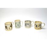 A collection of four Wedgwood Royal Commemorative mugs