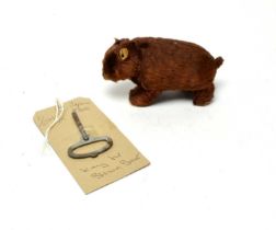 A vintage Japanese clockwork model brown bear toy