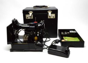 A Singer 222K electric sewing machine