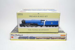 A Hornby ‘The Mallard’ electric train set; and a ‘The Flying Scotsman’ boxed set