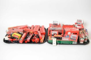 A collection of Coca-Cola advertising diecast model vehicles