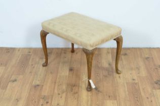 A Georgian style walnut dressing table stool
