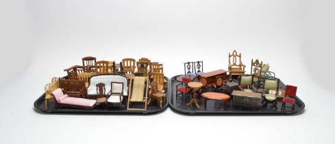 A collection of vintage dolls house chairs