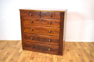 A mahogany chest of drawers.