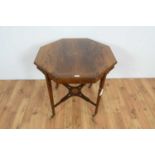 An Edwardian octagonal inlaid rosewood centre table