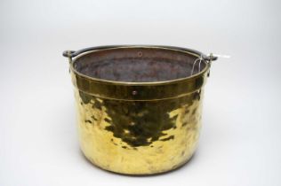 A Victorian brass coal scuttle