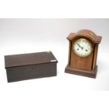 An antique music box; and a mantel clock