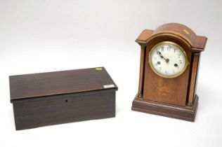 An antique music box; and a mantel clock