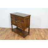 A 1930's Jacobean revival carved oak buffet/hutch,