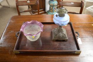 An Oriental tea tray; and an oil lamp