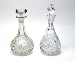 Two cut glass decanters with stoppers