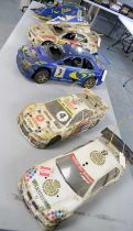 Four radio control model racing cars