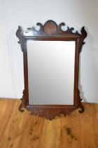 A 19th Century inlaid mahogany wall mirror.