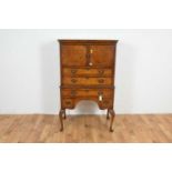 A Queen Anne style walnut and burr-walnut tallboy,