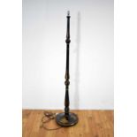 A decorative mid 20th Century black lacquered chinoiserie standard lamp,