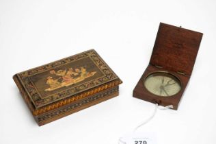 An antique pocket compass; and a cigarette box