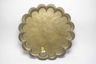 An Eastern scalloped circular tray or wall plaque