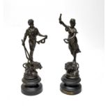 A pair of French bronzed spelter figures