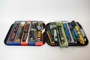 A collection of 00-Gauge model locomotives and tenders