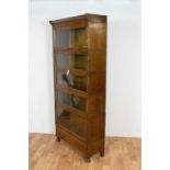 An early 20th Century five tier oak Globe Wernicke style bookcase