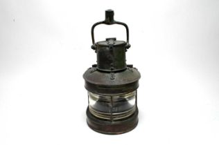 A vintage marine nautical ships lamp