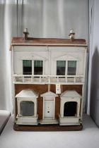 A vintage two storey dolls house