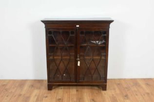 A late 19th Century inlaid mahogany bookcase,