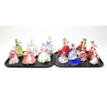 A selection of Royal Doulton ceramic figures of ladies,