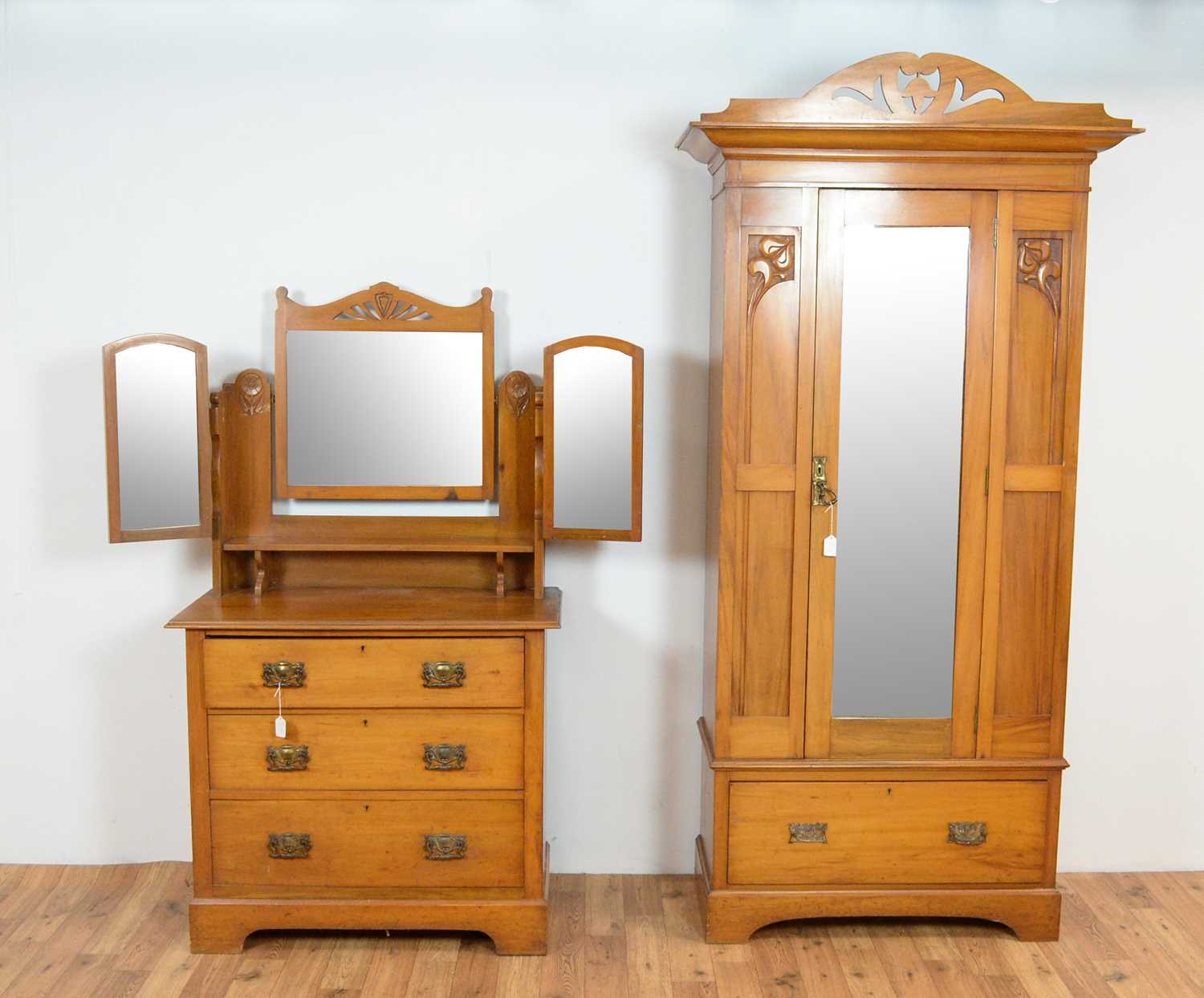 An early 20th Century satin walnut bedroom suite