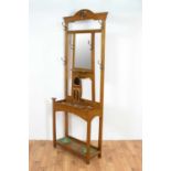 An early 20th Century oak hallstand