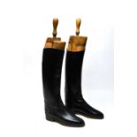 A pair of vintage Regent black leather riding boots