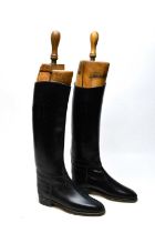 A pair of vintage Regent black leather riding boots