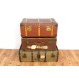 A collection of three vintage 20th Century trunks
