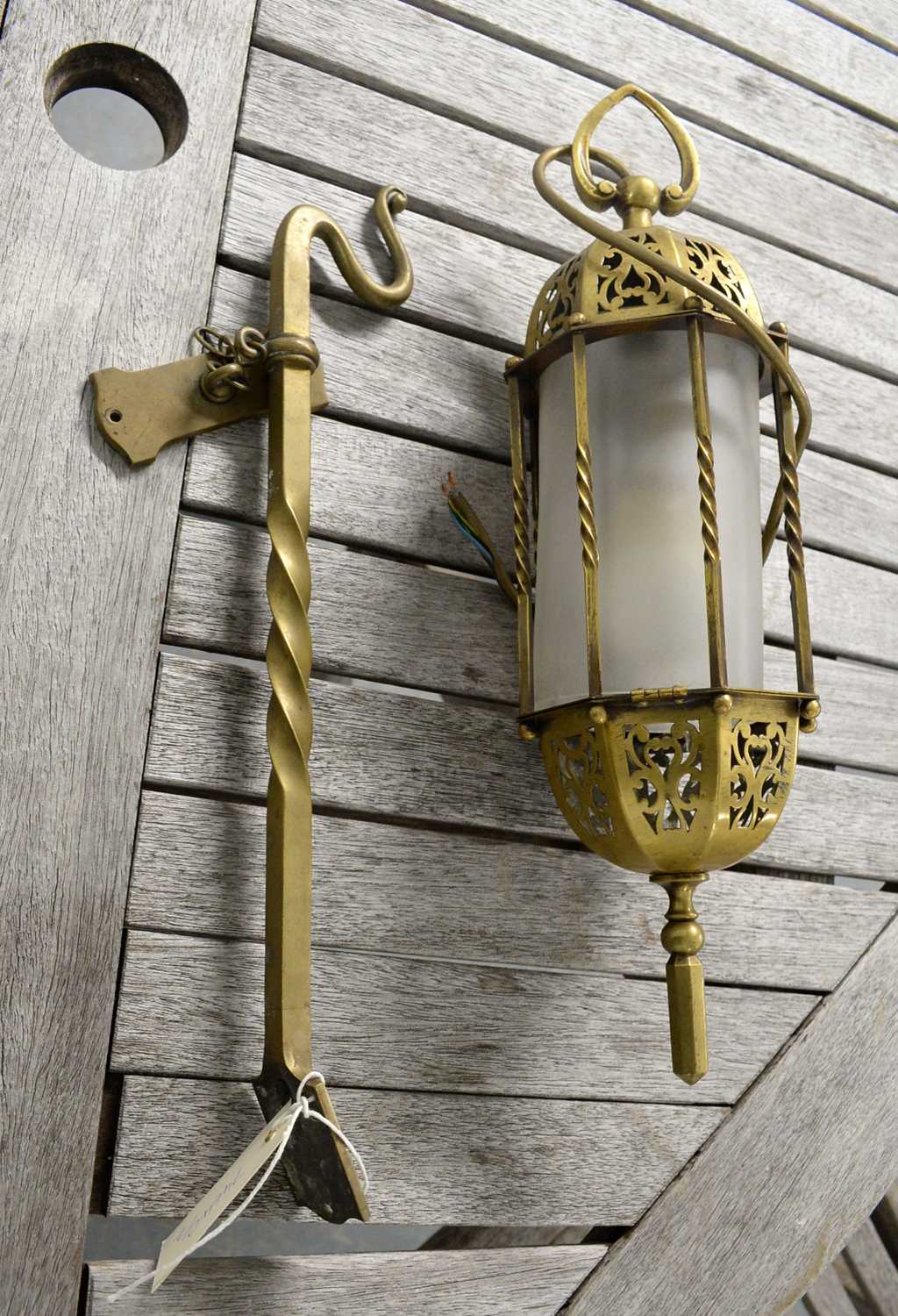 An Eastern brass lantern wall light