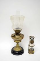 An early 20th Century brass oil lamp; and an Eccles miners' safety lamp