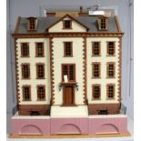 A vintage five storey dolls house