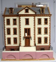 A vintage five storey dolls house
