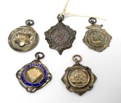 Five silver sporting trophy fobs,