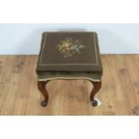 An attractive Victorian carved walnut stool.
