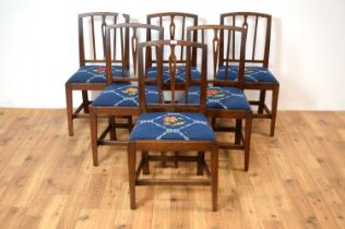 A set of six early 20th-century oak dining chairs