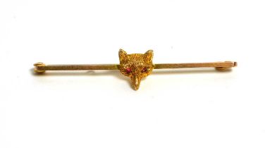 A fox mask pattern bar brooch