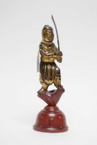 A Japanese gilt lacquered wood figure of a warrior