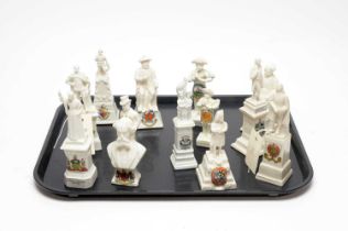 A collection of crested ceramic statues